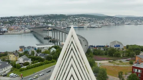 Flight over modern Arctic Cathedral in Tromso Stock Footage 129449645