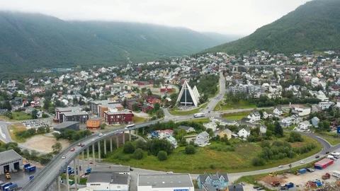Flight over modern Arctic Cathedral in Tromso Stock Footage 129449740