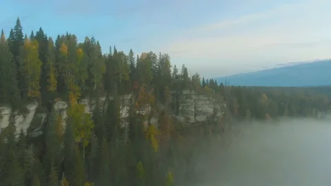 Flight over morning mist in a river valley Stock Footage 115911563