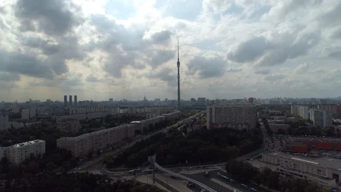 Flight over Moscow cityscape dramatic clouds Ostankino television tower quarters Stock Footage 118506649