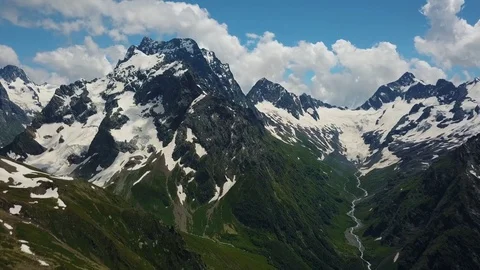 Flight over Mount Dombai, Caucasus, Russia. Republic of Karachay-Cherkessia. 4K Stock Footage 82533064