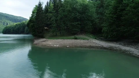 Flight over the mountain lake Video stock 90494690