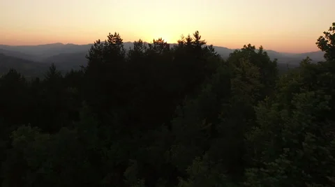 Flight over mountain landscape at sunset. Stock Footage 62811243
