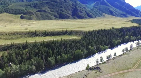 A flight over a mountain river in the Altai Stock-Footage 67836376