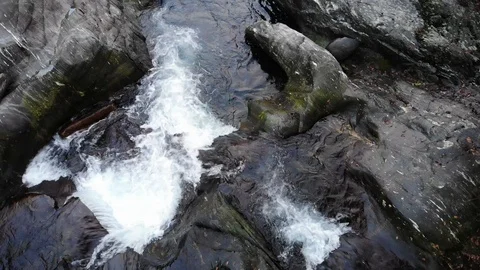 Flight over the mountain river between rocks and vegetation Stock Footage 118774108