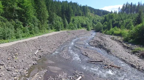 Flight over the mountain river in the forest Stock Footage 67384133