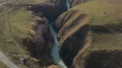 Flight over a mountain river into a gorge Stock Footage 150569712