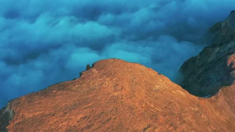 Flight over mountain top and dense fog. Stock Footage 142735974