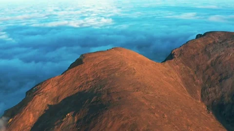 Flight over mountain top and dense fog. Stock Footage 142735978