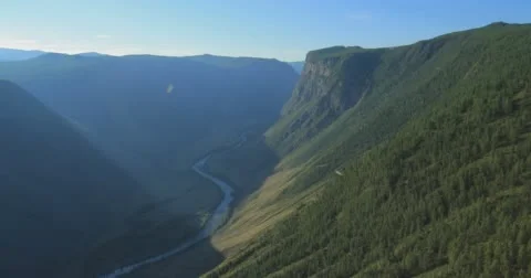 Flight over the Mountains. Altai. Siberia. Flying over the River. Forest Valley. Stock Footage 63426720