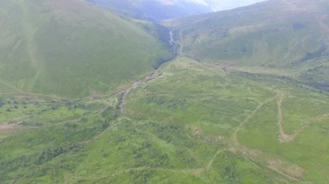 Flight over mountains in the haze Stock Footage 67248091