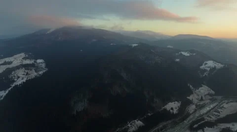 Flight over the mountains at sunset Stock Footage 58881681