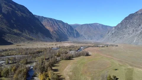 Flight over the mountains. Top view hills and river Stock Footage 142418306