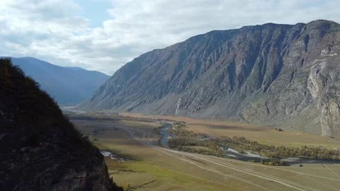 Flight over the mountains. Top view hills and river Stock Footage 142418767