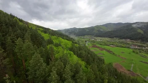 Flight over mountains,after rainy, there are clouds, Stockbeeldmateriaal 273144165
