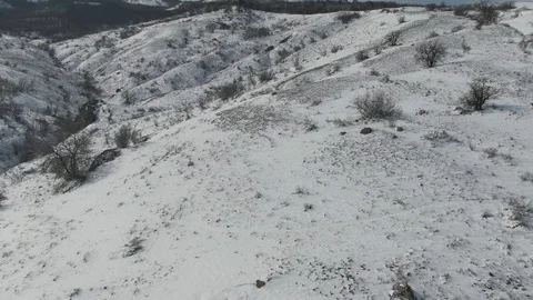Flight over the mountainside in winter Stock-Footage 105681651