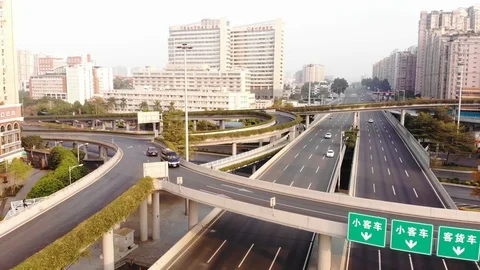 Flight over a multi-level traffic interchange in the city Video stock 102561597