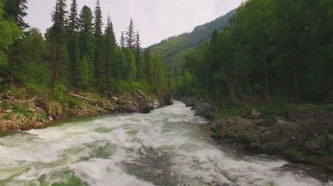 Flight over narrow mountain river Video stock 66860743