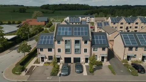 Flight over a new housing development solar panels on all roofs beige Stock Footage 296820179