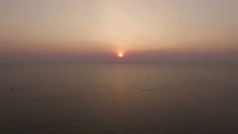 Flight over ocean at dawn Stock Footage 94034292