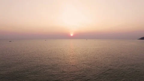 Flight over ocean at dawn Stock Footage 94034352