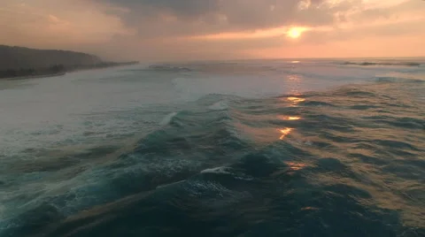 Flight over of ocean sea sunset - aerial shot of Ocean, Hawaii Stock Footage 60888917