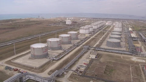 Flight over oil storage 動画素材 123697329