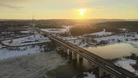 Flight over the Oka River, a road bridge traffic in winter Stock-Footage 254068535