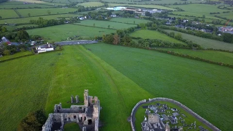 Flight over an old Abbey and grave yard Stock Footage 109351467
