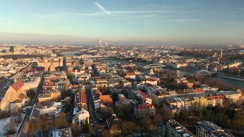 Flight Over the Old District of Krakow on the Riverbank at Sunset Stock Footage 300087470