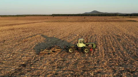 Flight Over Old Farm Machine in the Sunset 3 Stock-Footage 137309687