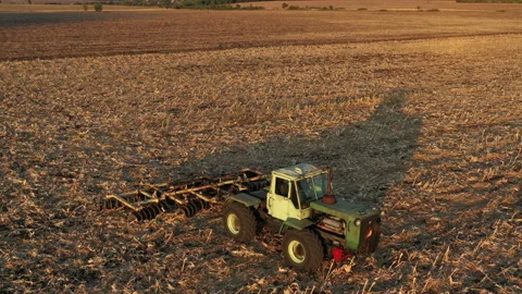 Flight Over Old Farm Machine in the Sunset 4 Stock-Footage 137309982