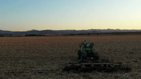 Flight Over Old Farm Machine in the Sunset 10 Stock Footage 137310272