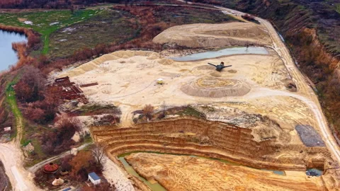 Flight over open-cast for sand mining. A truck stands in the center of the Stock Footage 331469820
