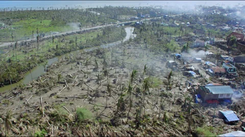 Flight over the outskirts of a destroyed town after typhoon Haiyan Stock Footage 33889721