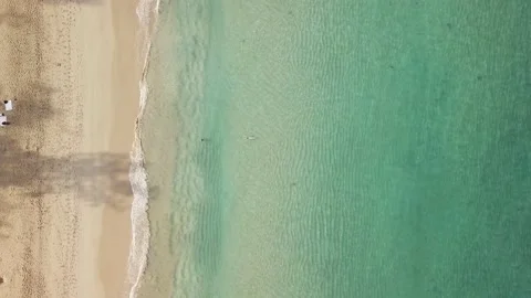 Flight over Paradise sandy beach with turquoise water Stock Footage 133501844