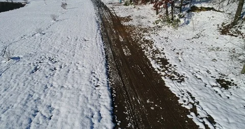 Flight over path in winter 스톡 동영상 88934401