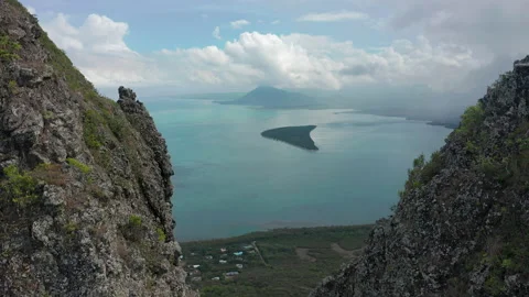 Flight over the peak of the mountain. Le Morne Brabant mountain in Mauritius Stock Footage 171769035