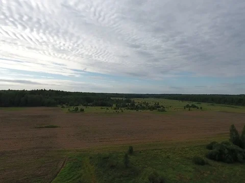 Flight over the plowed field Stock Footage 70347617