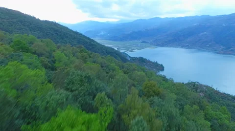 Flight over Pokhara Valley Nepal aerial 4k video. Flying Phewa lake mountains Stock Footage 64825586
