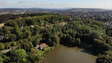 Flight over a pond with a view of the small town of Horn in Westphalia. Stock Footage 138161412