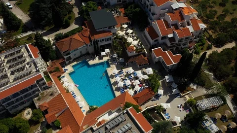 Flight over Pool area at hotel - Supetar, Croatia Stock Footage 111337970
