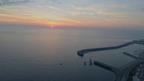 Flight over port. During sunset at sea. Aerial view Stock Footage 99706733