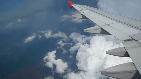 Flight over the rainbow. aerial view through an airplane window. Stock Footage 134150746