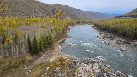 Flight over the rapids of a beautiful mountain river, around rocks, high Video stock 147241754