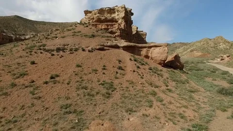 Flight over red rocks in sunny weather.  Canyon Charyn, Kazakhstan. Stock Footage 77741985
