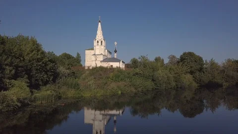 Flight over the river and beautiful church in Suzdal Stock Footage 94628469