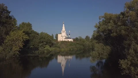 Flight over the river and beautiful church in Suzdal Stock Footage 94628863
