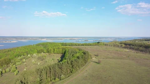 Flight over the river and forest at spring time. Stock Footage 129499766