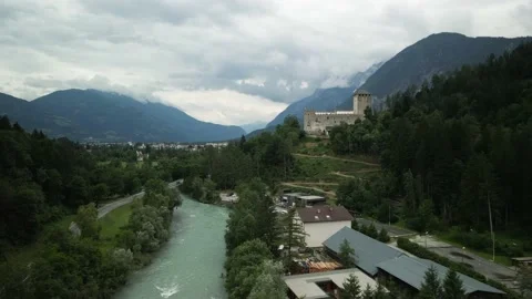 Flight over a river in the mountains at a castle Stock Footage 159058274